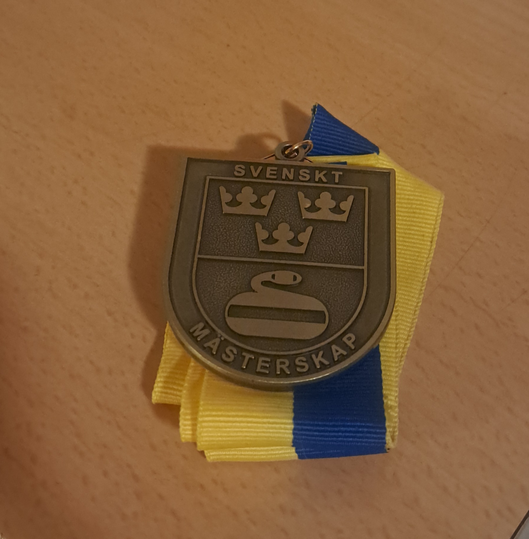 Medalj SM rullstolscurling